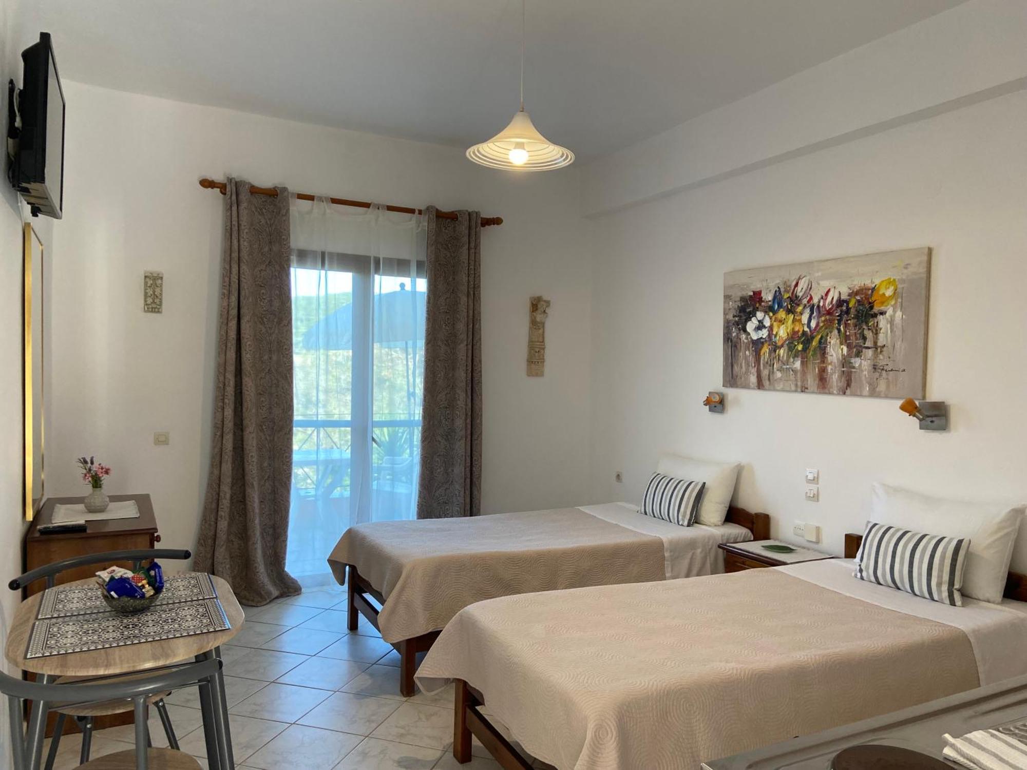 Floros Apartments Агиос Стефанос Экстерьер фото
