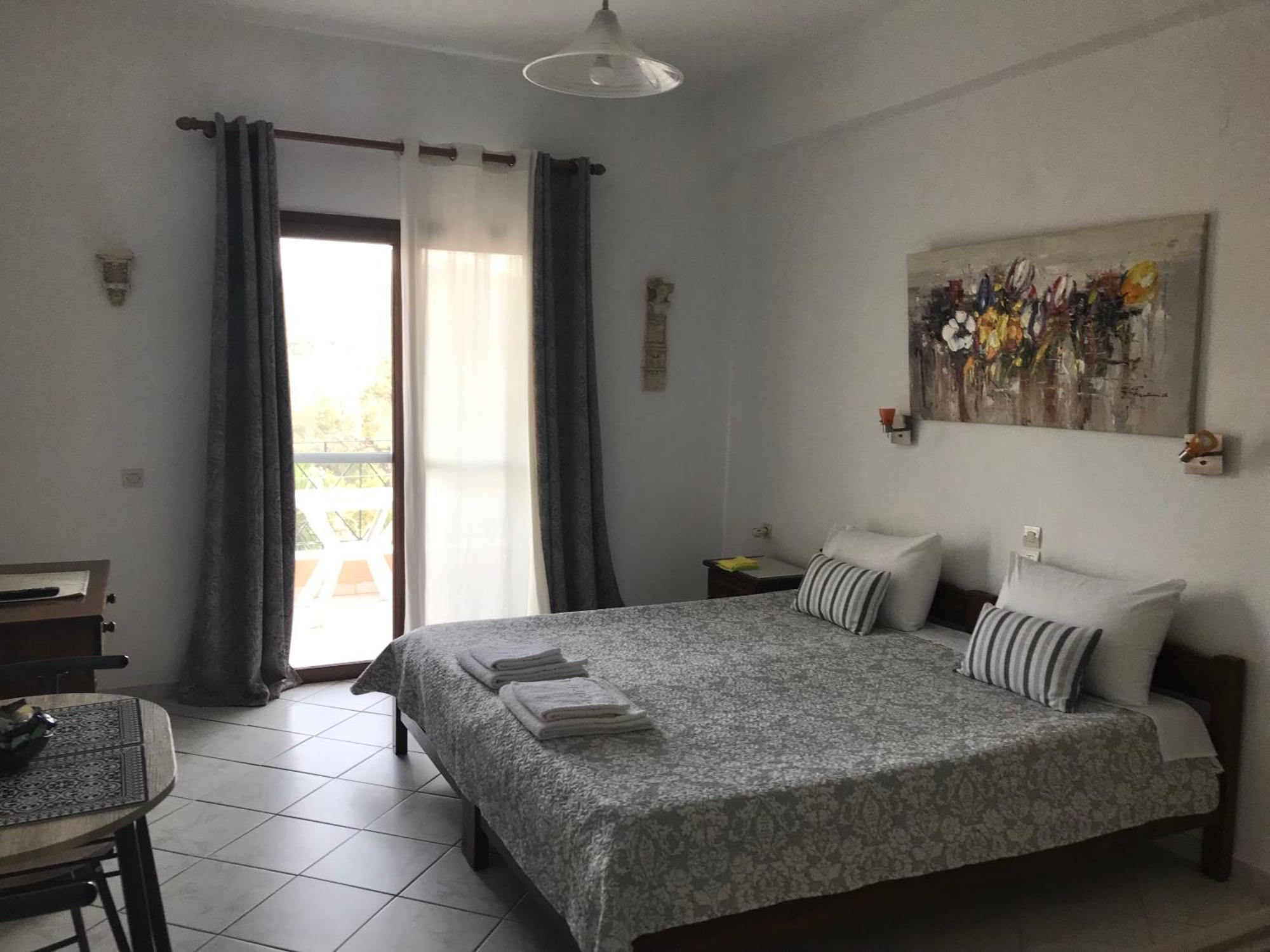 Floros Apartments Агиос Стефанос Экстерьер фото