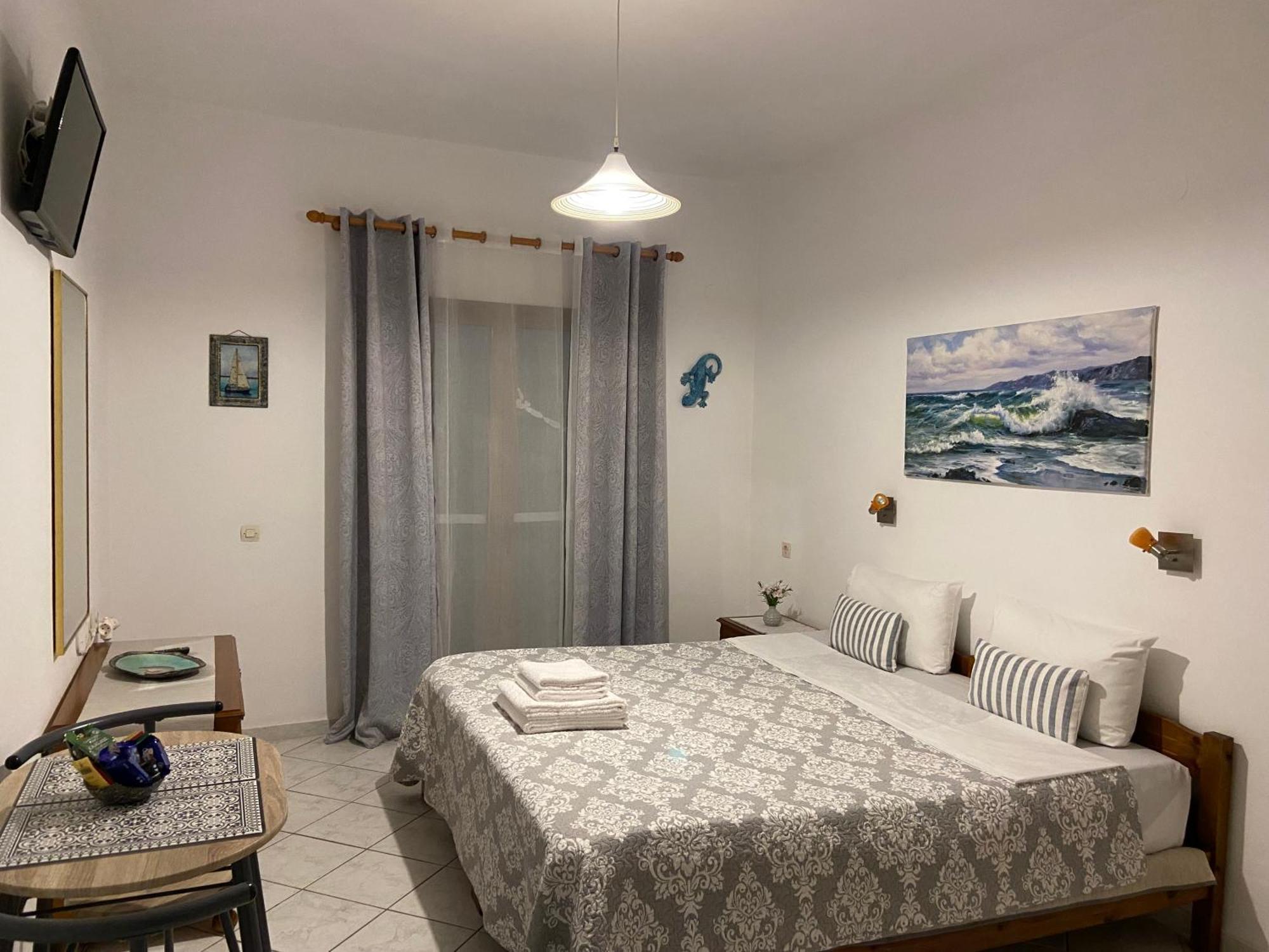 Floros Apartments Агиос Стефанос Экстерьер фото