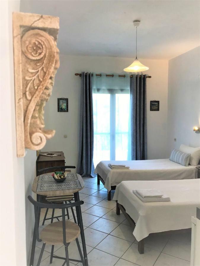 Floros Apartments Агиос Стефанос Экстерьер фото